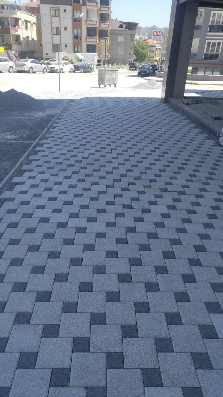 Dekoratif siyah beyaz kilitli parke taşı